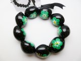Polished Black Kukui Nut Handpainted w/ Green Hibiscus Stretchy