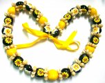 Yellow Painted Kukui Nut lei w/ Shell-27 Nuts