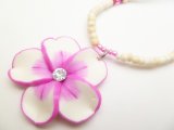 35mm flower w/ C.Z Stone in 2-3mm cream color Natural Coco bead