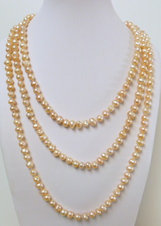 64" Peach 7-8mm 7-8mm Potato Shape Fresh Water Pearl Necklace